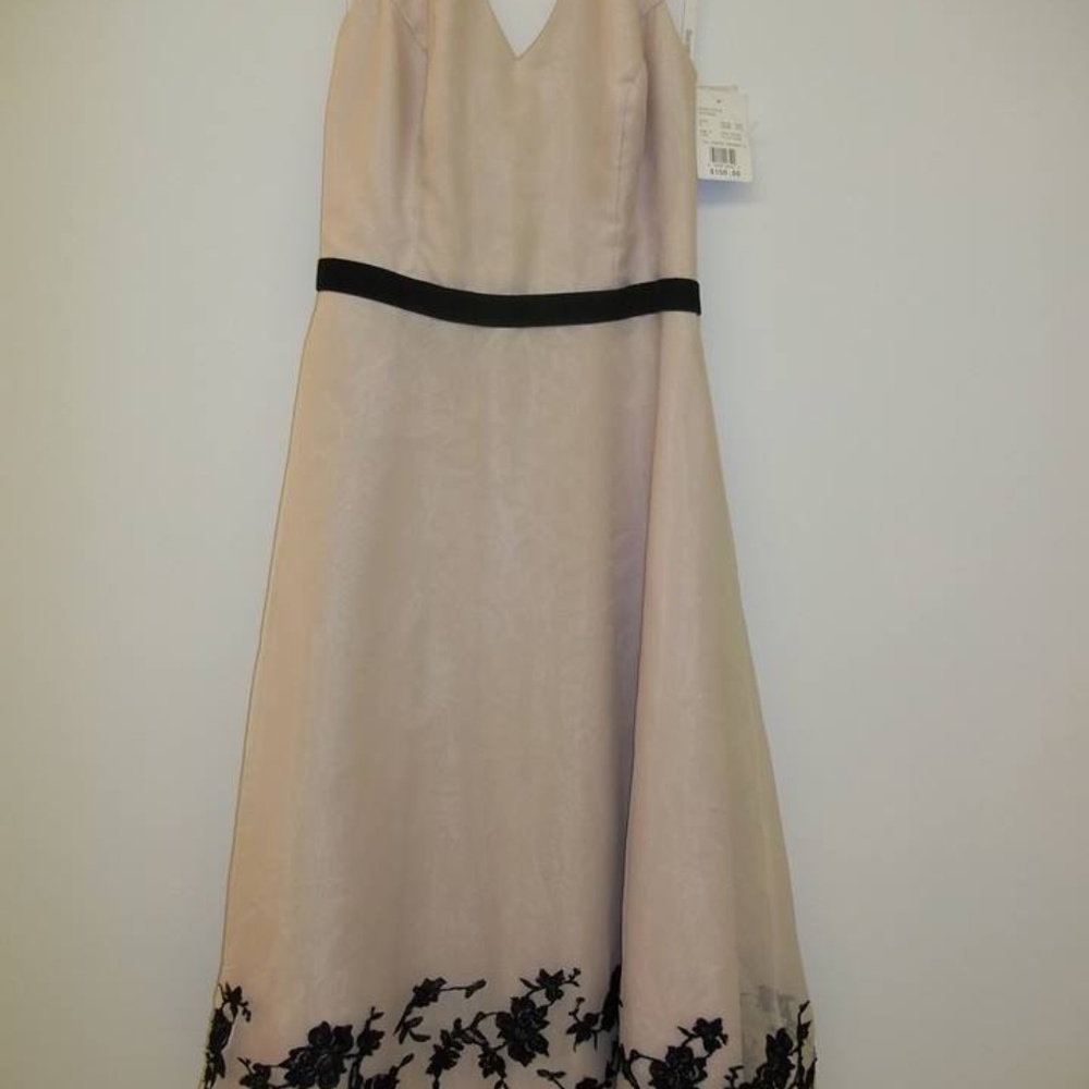 Cream Davids Bridal size 8 tea length gown. NWT